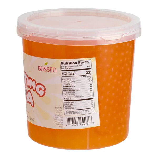 A large plastic tub of Bossen Pure25 Mango Bursting Boba with a nutrition facts label on the side.