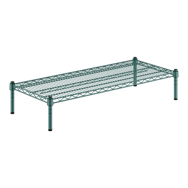 A green metal Regency wire shelf with black legs.