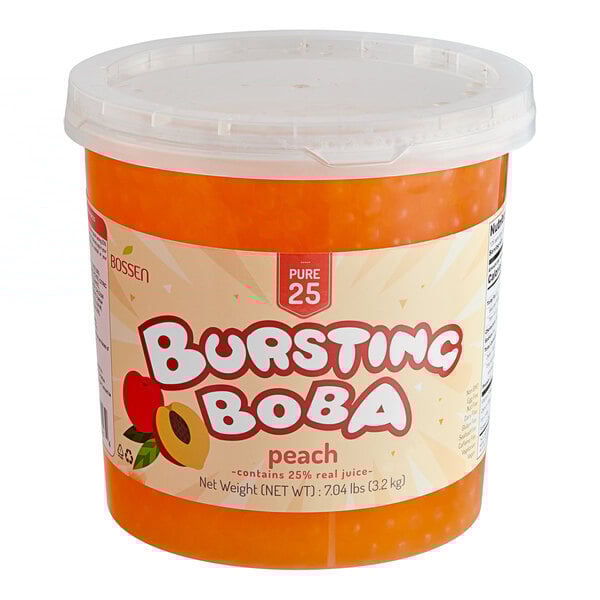 A plastic container of Bossen Peach Bursting Boba on a table.