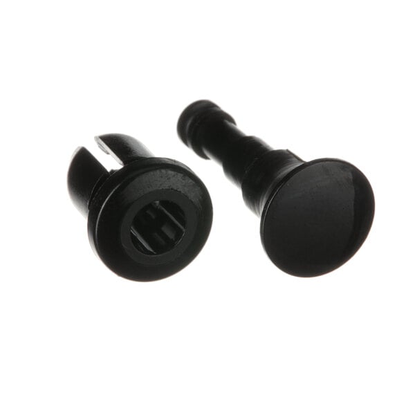 Two black plastic Follett push pins.