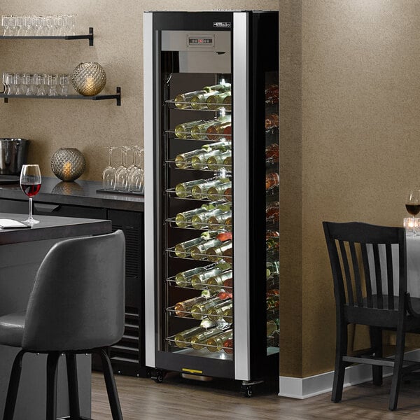 An AvaValley glass-sided wine merchandiser with wine on a table.