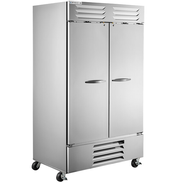 a white refrigerator with two doors
