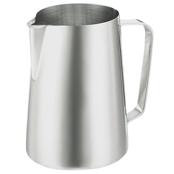 A silver stainless steel Walco Saturn pitcher with a handle.