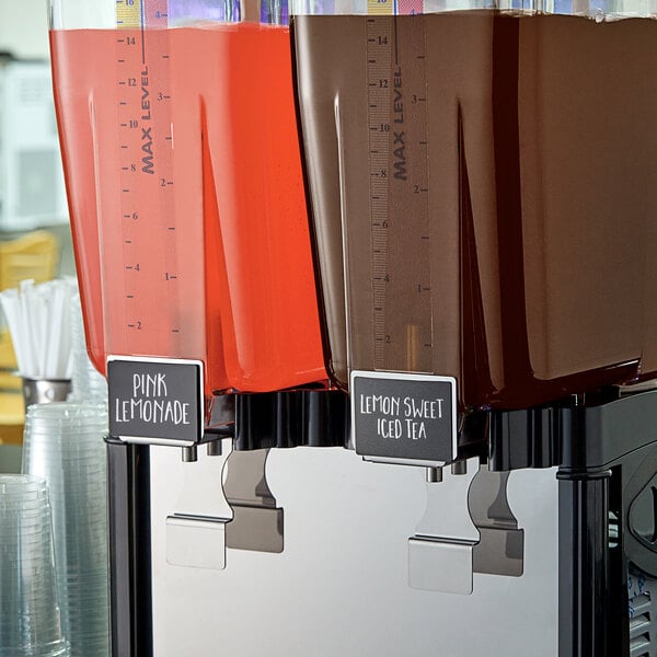 A beverage dispenser with a drink in it.