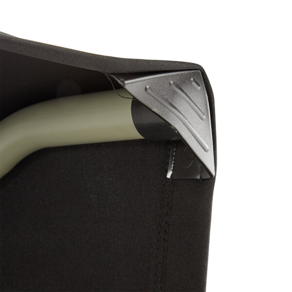 A corner of a black Snap Drape spandex table cover on a table.