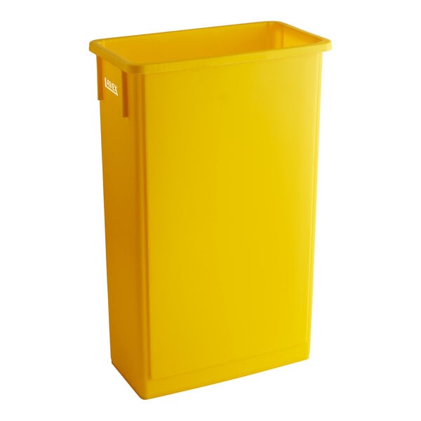 A yellow plastic rectangular Lavex trash can.