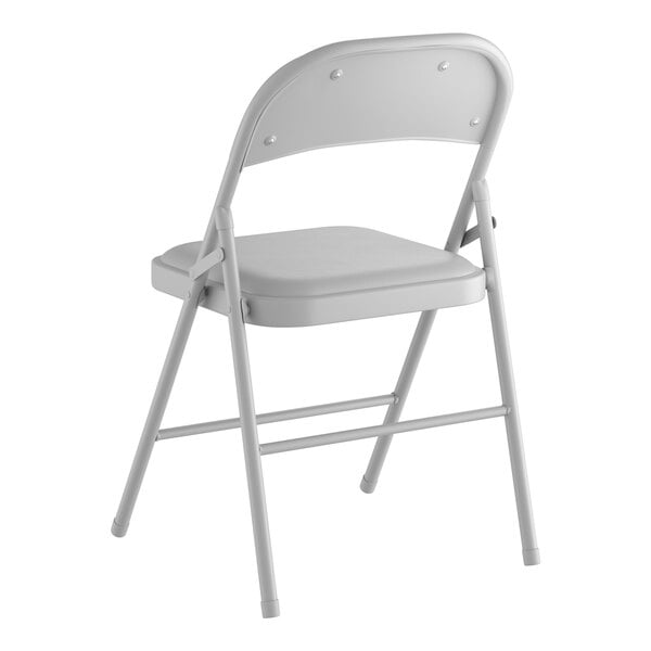 A gray vinyl folding chair with a padded seat.