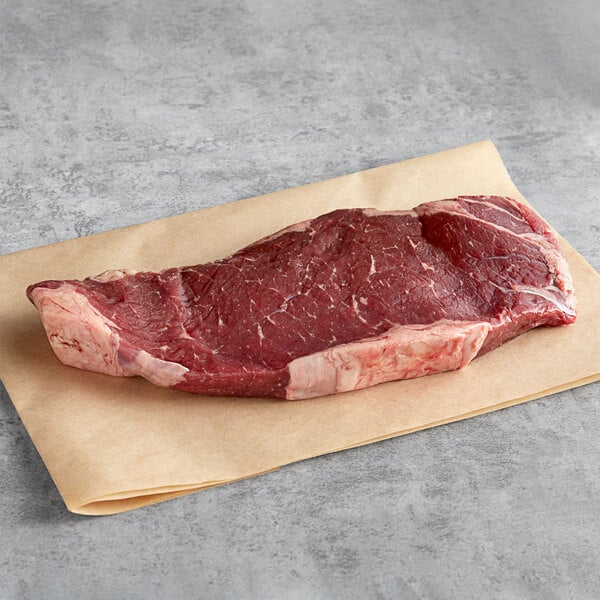 Raw New York strip steak