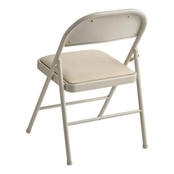 Lancaster Table & Seating Beige Vinyl Folding Chair with Padded Seat