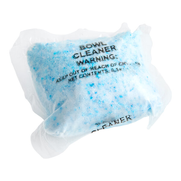 A sealed packet containing blue and white concentrated toilet bowl cleaner powder.
