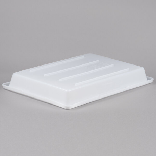 A white Rubbermaid polyethylene food storage container with a lid.