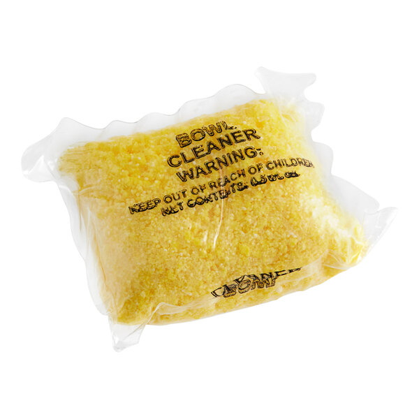 A yellow Noble Chemical QuikPacks All Purpose Cleaner pack.