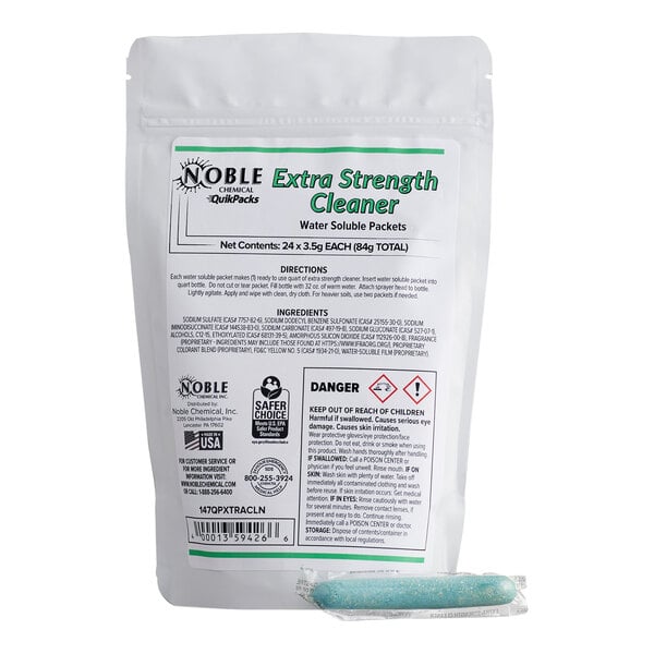 A bag of Noble QuikPacks concentrated extra strength cleaner packets with one blue water-soluble packet shown in front.