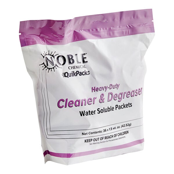 A white bag of Noble Chemical heavy-duty cleaner and degreaser QuikPacks with purple text.