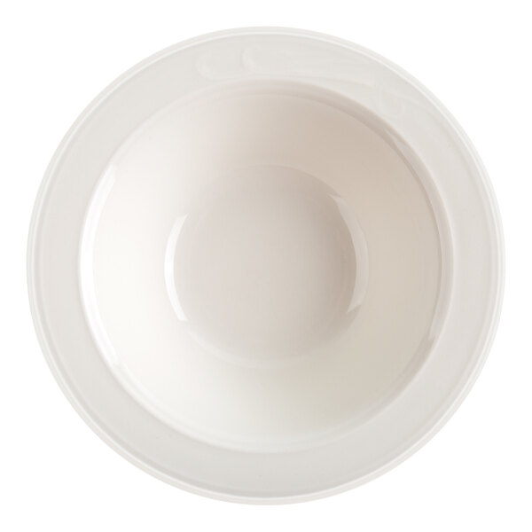 A top-down view of a plain, round, white bowl with smooth edges.