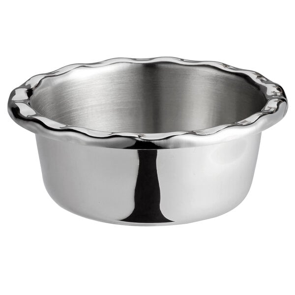 A silver Vollrath stainless steel bowl with a ruffled edge.