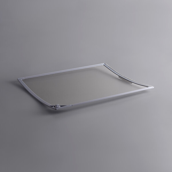 A clear glass lid with a metal frame.