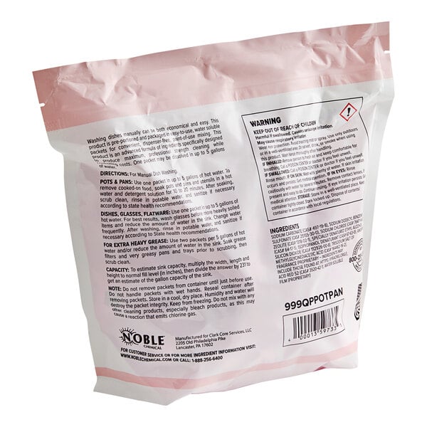 A pink plastic tub of Noble Chemical QuikPacks with black and white labels.