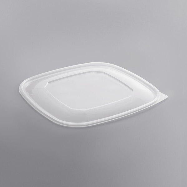 A clear Fineline plastic lid on a white square plastic bowl.