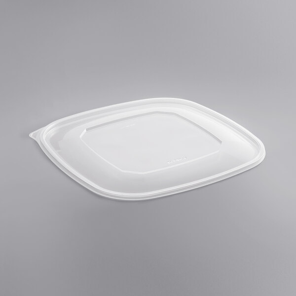 A white plastic Fineline Super Bowl Plus lid on a white plastic square bowl.