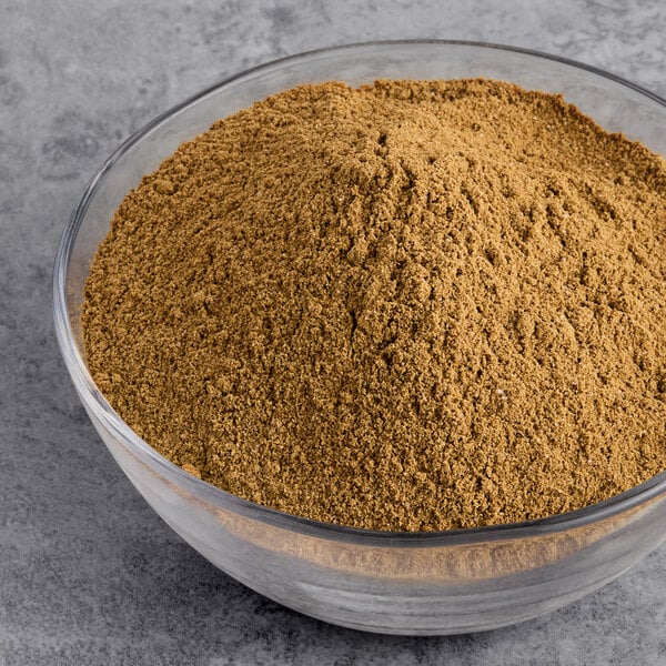 A bowl of brown Regal Big Flavor BBQ Rub seasoning.