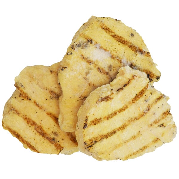 Three Brakebush grilled chicken breast fillets on a white background.