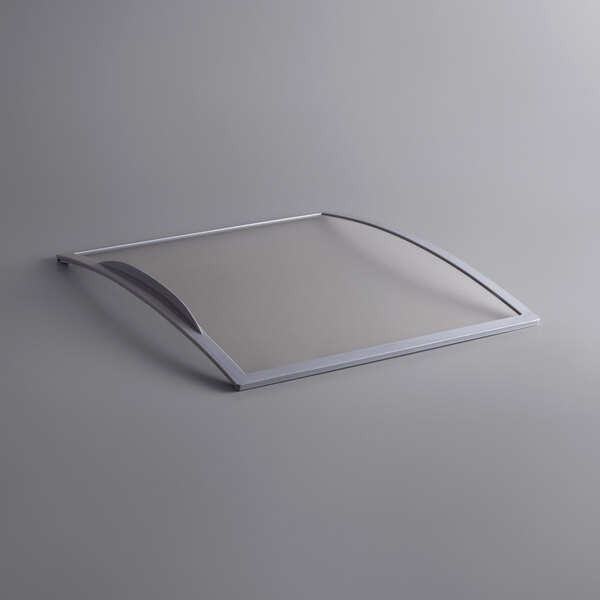 a silver rectangular object with a curved edge