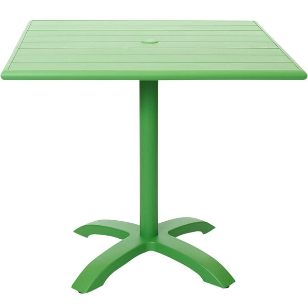 a green table leg with a round top