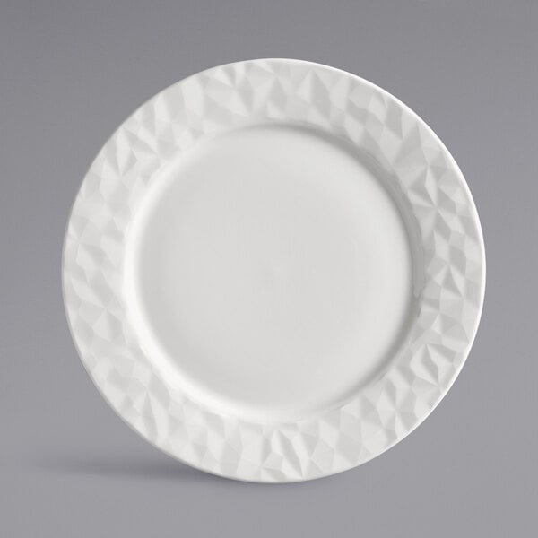 a white plate with a diamond pattern