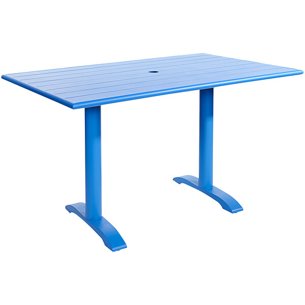 A blue rectangular BFM Seating Bali table with two legs and an umbrella hole.