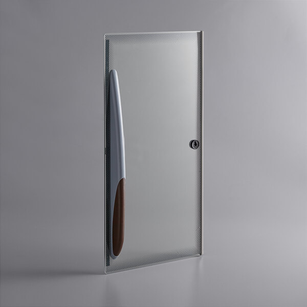 A white sliding glass door with a brown handle.