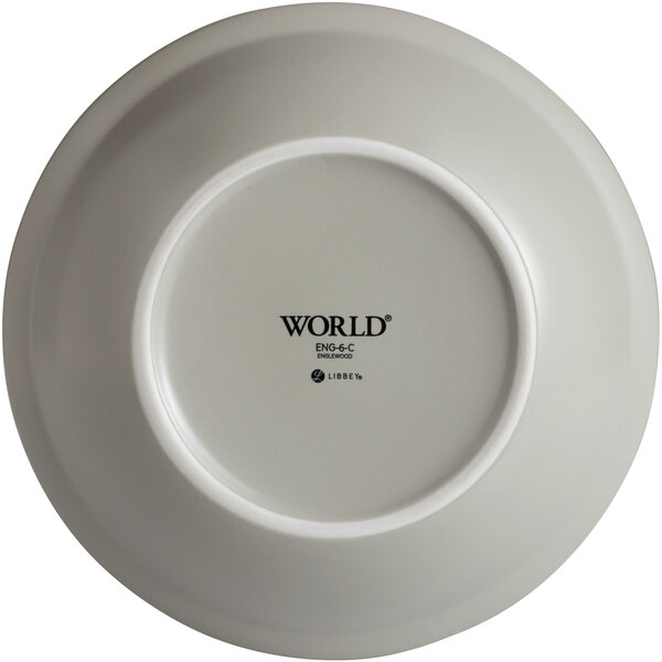 A white porcelain serving bowl with the words "Mint Cream" in black text.