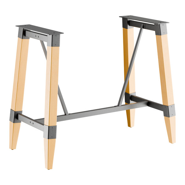A bar height trestle table base with a bleached oak finish and metal supports, designed for 30" x 60" table tops.