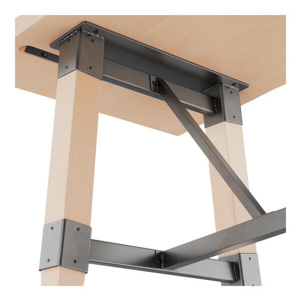 A standard height trestle table base with a bleached oak finish and metal supports, designed for 30" x 72" table tops.