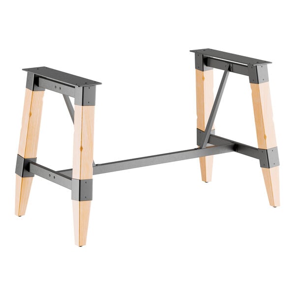 Lancaster Table & Seating industrial trestle table base with metal and wood legs.