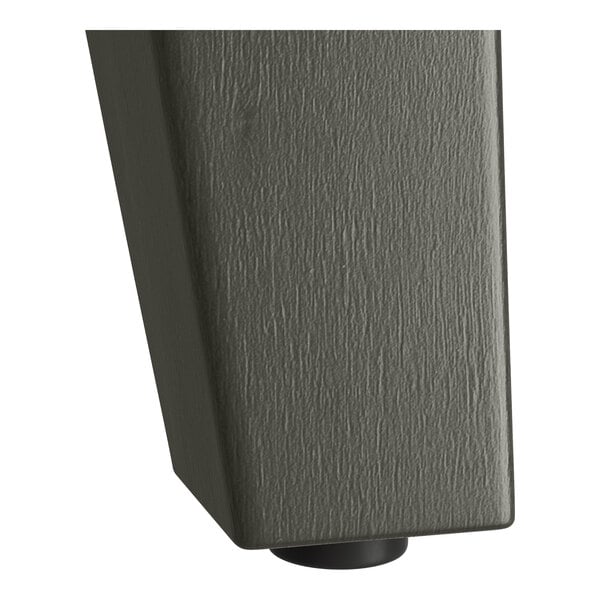 A Lancaster Table & Seating industrial slate gray trestle table base.