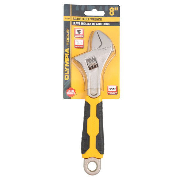 A yellow and black Olympia Tools adjustable wrench with a molded handle in a package.