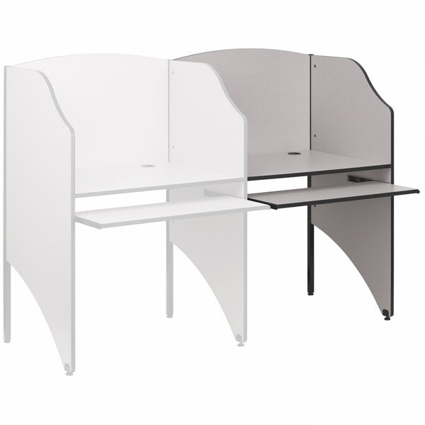 A grey Flash Furniture study carrel with a shelf.