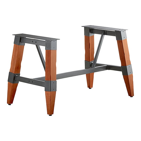 A pair of metal and wood trestle table bases.