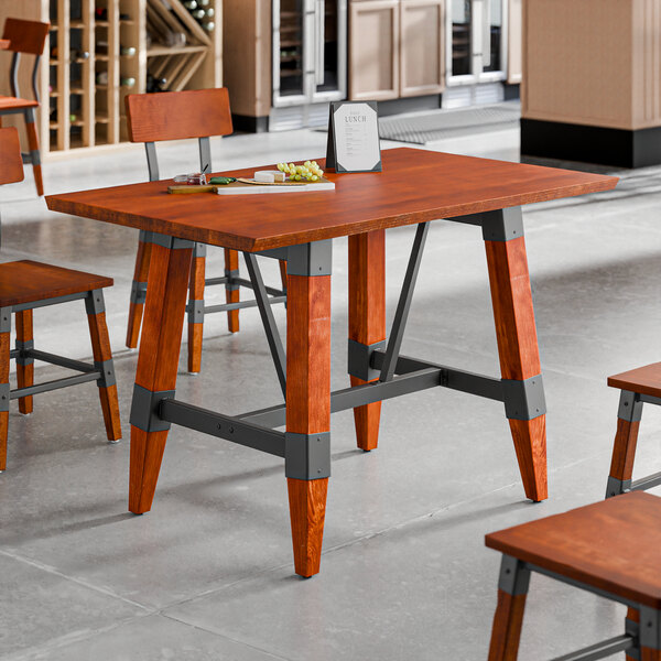 Lancaster Table & Seating Industrial 30" x 48" Solid Wood Live Edge Standard Height Trestle Base Table with Rustic Mahogany Finish