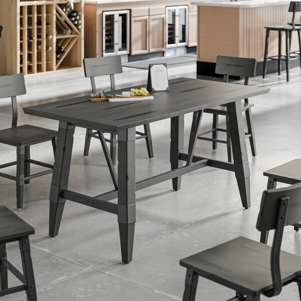 A Lancaster Table & Seating live edge wood table with chairs and a plate on it.