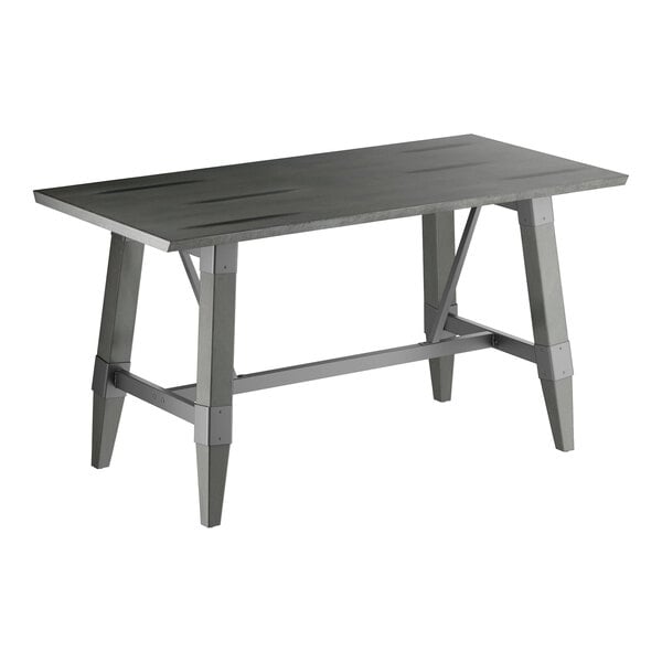 A rectangular table with a solid wood top and trestle base, featuring a slate gray finish and angled legs.