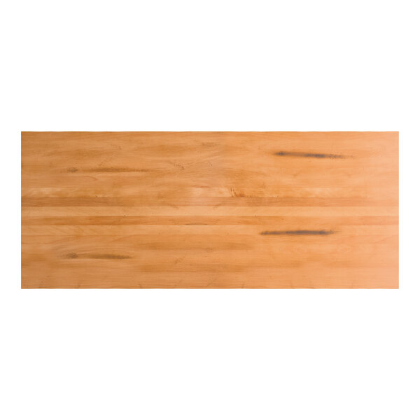 A rectangular solid wood bar height table top with a honey maple finish and live edge design.