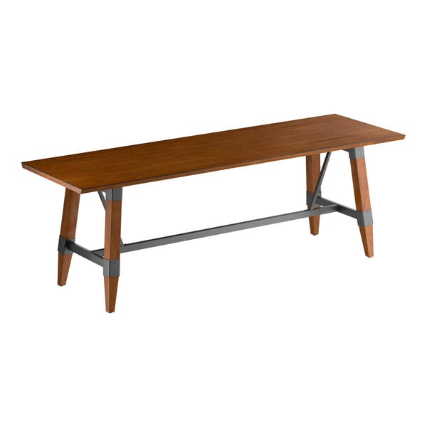 A rectangular wooden table with a rustic walnut finish, featuring angled legs and metal supports.