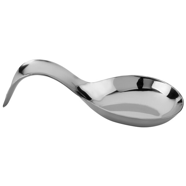 A Walco stainless steel spoon rest with a silver spoon on it.