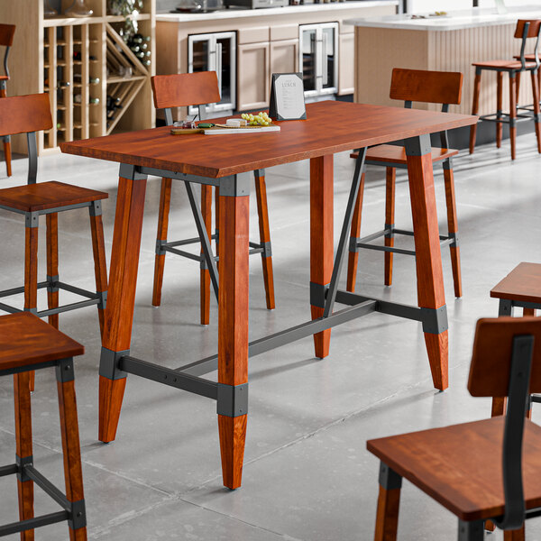 Lancaster Table & Seating Industrial 30" x 60" Solid Wood Live Edge Bar Height Trestle Base Table with Rustic Mahogany Finish