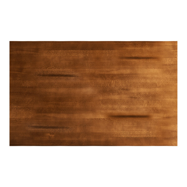 A rectangular solid wood bar height table top with a rustic walnut finish.