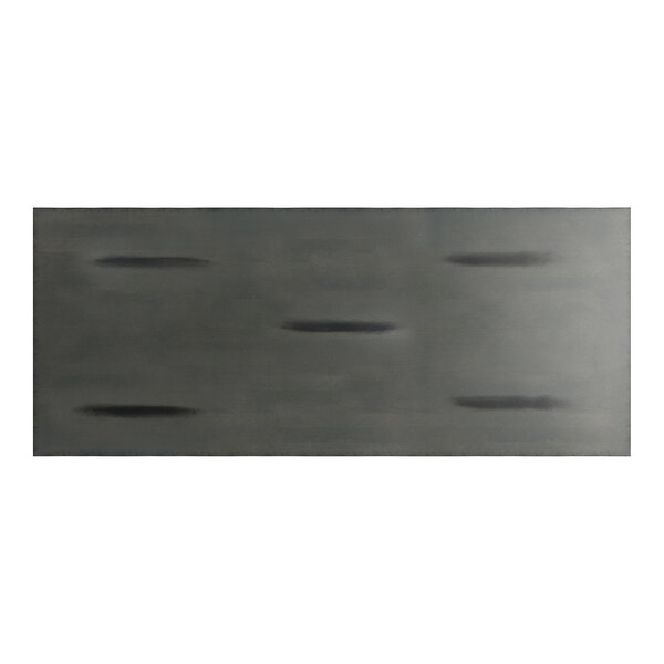 A rectangular, slate gray surface with a subtle wood grain pattern and several darker, elongated marks distributed across it.