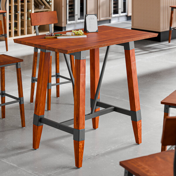Lancaster Table & Seating Industrial 30" x 48" Solid Wood Live Edge Bar Height Trestle Base Table with Rustic Mahogany Finish