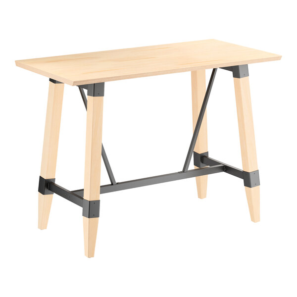 A rectangular bar-height table with a light wood top and legs, featuring black metal support bars and accents.